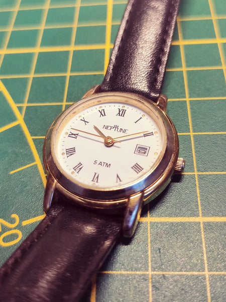 Montre quartz femme Neptune - Années 80 - Le Sélectionneur - Brocante en ligne