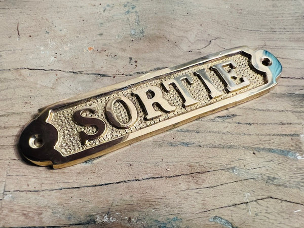 Plaque décorative de porte en laiton "Sortie"