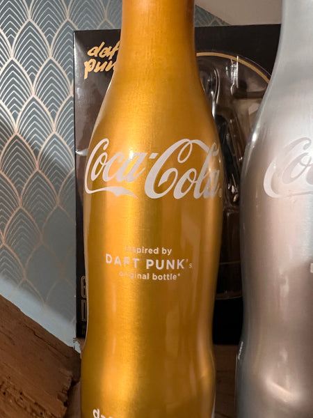 Duo de bouteilles Coca Cola X Daft Punk or et argent - 2011