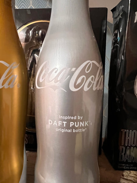Duo de bouteilles Coca Cola X Daft Punk or et argent - 2011